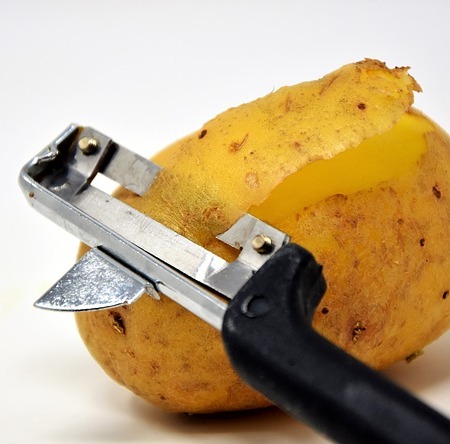 Potato being peeled