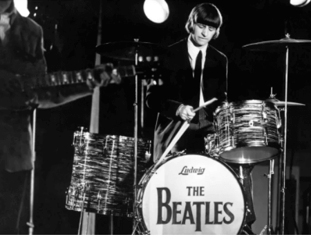 Ringo Starr playing the drums with The Beatles