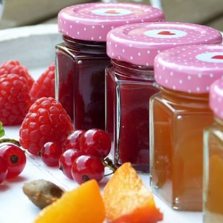 Jam arranged in colourful jars